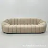 Sofá Curvo Minimalista Italiano Luxo Leve Pequeno Apartamento Salão de Beleza Loja de Roupas Celebridade da Internet Sofá Abóbora Móveis de Designer