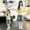 Conjunto de Camiseta de Verano para Niñas 2026 Nuevo Estilo Coreano Moda Camiseta de Manga Corta para Niña Pequeña y Shorts de Mezclilla Conjunto de Dos Piezas Tendencia