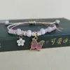 Nova versão coreana de pulseira simples de flor borboleta presente para estudantes namoradas tecelagem manual joias transfronteiriças atacado