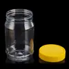 Botella Redonda Transparente de Plástico para Mascotas 450ml con Tapa Amarilla, Frasco de Empaque de Grado Alimenticio para Almacenamiento de Dulces y Frutas Conservadas, Frasco de Almacenamiento, Sellado
