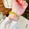 Joyería de oro Jin Yan con oro de arena vietnamita Xizang Buda de cuatro caras patrón martillado pulsera tejida cuerda tejida a mano diy