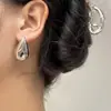Brincos de Tarraxa Grandes de Metal Brilhante Exagerados Simples Moda Popular Transfronteiriça Europeia e Americana Argola de Prata Brincos de Temperamento Único de Alta Qualidade