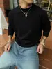 Suéter de punto negro de cuello alto medio estilo Old Money para hombre, versión coreana de invierno, top de capa interior cálido de alta gama