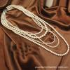 Collar de perlas multicapa retro europeo y americano para mujer, cadena de suéter larga de moda japonesa y coreana, accesorios que combinan con todo para primavera y verano, colgante para mujer