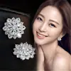 Venta Caliente AliExpress Venta Caliente Pendientes de Flor de Sol Chapados en Plata con Circonita Estilo Japonés y Coreano Femenino Pendientes Completos de Diamante Ojo de Caballo Copo de Nieve
