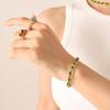 Conjunto de pendientes, collar y pulsera de circonitas de color con diseño de nicho, de acero de titanio transfronterizo, resistente a la decoloración, joyería al por mayor.