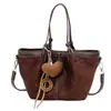 Bolso tipo cubo informal de gran capacidad 2026, bolso versátil para mujer, nuevo y elegante bolso de hombro de ante para el día a día, simple y retro