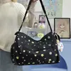 Bolso cruzado de mujer de alta calidad transfronterizo, estilo nuevo, Bolso de hombro colorido con estrellas, estilo universitario, Bolso de tela ligero de gran capacidad para estudiantes