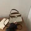 Bolsa de nicho estilo francês para mulheres, nova moda outono e inverno de 2026, bolsa de ombro simples, bolsa transversal casual para o dia a dia