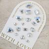Venta al por mayor de joyas para uñas, transparentes, con punta puntiaguda, súper brillantes, grandes, torcidas, con forma de corazón, hacha, gotas de agua, mariposa cuadrada gruesa, diamante blanco, accesorios para uñas