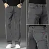 Nuevos Jeans de Otoño 2026 para Hombre, Cintura Media, Pierna Recta Holgada, Tallas Grandes, Pierna Ancha, Algodón Adelgazante y Ligeramente Elástico