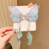 Nuevos accesorios Hanfu para niños clip de borla de mariposa estilo antiguo popular súper hada girl pasador de cinta accesorios para el cabello