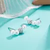 Conjunto de pendientes de lujo ligeros, pequeños y pequeños, con perla y circonita, con forma de arco sonriente, pendientes sencillos y dulces de alta gama para mujer.