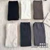 Calcetines blancos hasta la rodilla para mujer con textura acanalada vertical, adelgazantes y versátiles, material de algodón, cómodos y amigables con la piel, calcetines largos