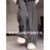 Calças Casuais Plus Size para Mulheres Primavera/Verão 2026 Finas Largas Estilo Preguiçoso Cintura Alta Perna Larga Emagrecedoras Calças Mochi