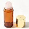 Botella dispensadora de aceite de ricino de vidrio ámbar de 50 ml, botella aplicadora roller de jade cristal rosa natural, botella aplicadora roller de cuarzo rosa