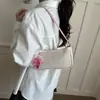 Bolso cuadrado pequeño de moda estilo dulce transfronterizo para mujer, nuevo bolso de hombro tejido de paja con bloques de color para el verano 2026, bolso de axila de moda