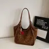 Bolsa Tote de Moda de Luxo para Mulheres 2025 Outono Nova Grande Capacidade Estampa de Leopardo Luxo Acessível Versátil Bolsa de Ombro Único para Axila