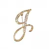 Temperamento de comercio exterior europeo y americano 26 broches de letras inglesas femenina diamante personalidad Joker moda corsage pin masculino accesorios