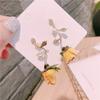 Joias de ouvido da nova moda coreana agulha de prata Brincos de flor rosa Primavera e Verão Brincos de pérola de alto senso atacado em estoque