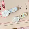Pinza para el pelo azul de lunares con lazo estilo coreano para mujer, nuevo modelo 2026, pinza lateral para flequillo y mechones, accesorio para el cabello