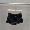 Pantalones cortos de PU negro para mujer, otoño/invierno, de cruce de fronteras 2026, de cintura alta, corte ajustado, versátiles, estilosos, hot pants con un estilo cool