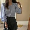 2024 Primavera e Verão coreano Dongdaemun Novo Design Sense Nicho Chic Love Button Round Neck Camisa de manga comprida para Mulheres