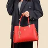Moda Feminina Coreana Nova Outono/Inverno 2026 Bolsa Transfronteiriça Bolsa de Maternidade Portátil Tendência Bolsa de Ombro Único Transversal Grande Capacidade com Múltiplas Camadas