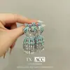 Campanilla de Viento con Lazo de Princesa Artesanía Pesada Zirconia Microincrustada Tridimensional Estilo Palacio Dulce Pendientes de Moda de Lujo Ligero