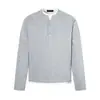 Camiseta de manga larga estilo retro americano de dos piezas falsas con cuello Henry para hombre y mujer, corte holgado, bloques de color, top informal, versátil y moderno