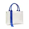 Exposición de Bolsas Tote de Gama Alta Evento Publicitario Bolsa de Lona Portátil Bolsa de Regalo Bolso Cruzado Personalización de Logo