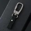 Llavero colgante de piel de vaca de primera capa transfronteriza, venta al por mayor, llavero de metal sencillo para coche, hebilla, llavero de Amazon