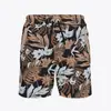 Pantalones cortos de playa hawaianos transfronterizos para hombre, corte holgado casual, talla grande, pantalones cortos de secado rápido para hombre para vacaciones en la playa y ocio