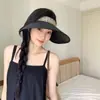 Nuevo sombrero de sol de ala ancha y copa abierta para mujer, sombrero de paja con recubrimiento negro de verano que hace que la cara se vea más pequeña, sombrero de sol versátil para salidas