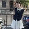Novo Conjunto de Moda Cannes Sem Mangas Feminino Urbano Verão Saia Branca Nicho 2026 Gola Polo
