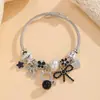 Estilo Lujo Ligero Blanco y Negro Pulsera de Cuentas DIY Múltiples Colgantes Cadena Hueso de Serpiente Moda Transfronteriza Europea y Americana Pulsera Accesorios para Mujeres Venta al por Mayor