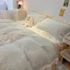 Nuevo conjunto de cuatro piezas de terciopelo de leche bordado estilo princesa con tema de encaje 2026