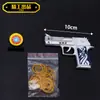 Comer pollo juguete Desert Eagle Oro banda de goma Pistola de juguete aleación arena Pistola Eagle puede disparar Modelo 10cm