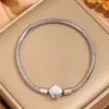 Nuevo Pulsera de Acero de Titanio Redonda Serpiente Corazón Colgante Pulsera para Mujer Nicho Lujo Ligero Gama Alta Transfronterizo Popular Pulsera