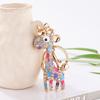 Coreano criativo girafa chaveiro bonito saco de metal pingente mulheres cristal diamante pequeno animal pequeno presente