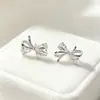 Pendientes de botón de plata de ley S925 con forma de lazo para mujer, nuevo estilo 2026, pendientes con sensación de alta gama, diseño de nicho, joyería de oreja simple de lujo ligero