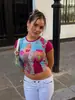 Camiseta Feminina Harajuku Verão Nova Gola Redonda Estampa de Desenho Color Block Manga Curta Top Solto Retrô Roupas Femininas