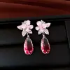 Brincos de pino prateados com pingentes de borboleta cravejados de diamantes e gotas d'água, luxo leve e sensação de alta qualidade, elegantes e versáteis para festas, brincos femininos