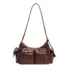 Nova bolsa de ombro estilo workwear retrô 2026 para mulheres, grande capacidade, múltiplos bolsos, couro macio, design de urso, bolsa transversal