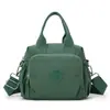 Bolsa feminina de grande capacidade, bolsa de ombro e transversal de nylon casual e moderna, bolsa feminina de lona à prova d'água multicamadas leve