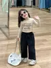 Otoño 2024 nueva ropa infantil coreana para niñas estilo chica popular camiseta corta con orejas de madera pantalones negros pantalones rectos