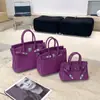 Bolso de mano de cuero platino con patrón de lichi, bolso tipo Kelly de gran capacidad para mujer, nuevo bolso de hombro de moda 2026