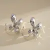 Brincos de Borboleta Plissados Transfronteiriços Europeus e Americanos, Simples e Únicos, Brincos Exagerados com um Toque de Nicho de Alto Padrão, Brincos Elegantes para Mulheres