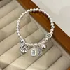 Gato de la Suerte Redondo Marca Ping An Feliz Fortuna Pulsera para Mujer Pulsera Elástica de Cuentas Redondas de un Solo Círculo Versátil Nicho Alta Gama Producto Nuevo