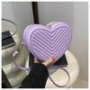 Bolso de corazón de estilo occidental para mujer, nuevo bolso pequeño con forma de corazón de melocotón, popular en Internet, elegante bolso cruzado de hombro combinable con todo.